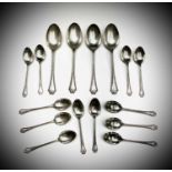 A set of twelve beaded silver teaspoons and four matching dessert spoons by Wilmot Manufacturing