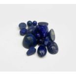Various lapis lazuli beads and cabochons, 148.7g.