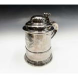 A George II English silver straight-tapered armorial tankard by John Fossey with a double domed