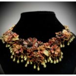 An ornate "amber" flower and bead necklace
