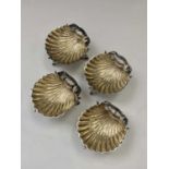 A set of four Victorian silver parcel-gilt shell salts by George Unite Birmingham 1877 and three
