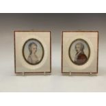 A pair of portrait miniatures, one signed N. Mansfeld, in bone frames. 14.25 x 12cm overall.