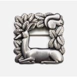 A Jensen square silver faun and squirrel brooch designed by Arno Malinowski for Georg Jensen, no.318