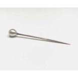 A gold stickpin with pearl finial, cased.
