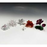 Swarovski Crystal - an orchid ornament, height 6cm, a lotus and one other ornament (all boxed)