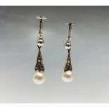 A pair of Swedish 18ct white gold 1920s drop earrings, with pearls and diamonds,