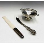 A pierced silver bon-bon basket 45gm, a paper-knife by Mordan and a butter knife with filled handle