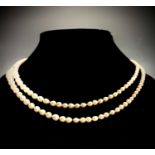 A double-strand pearl necklace the largest pearl 7.5mm, rose diamond clasp