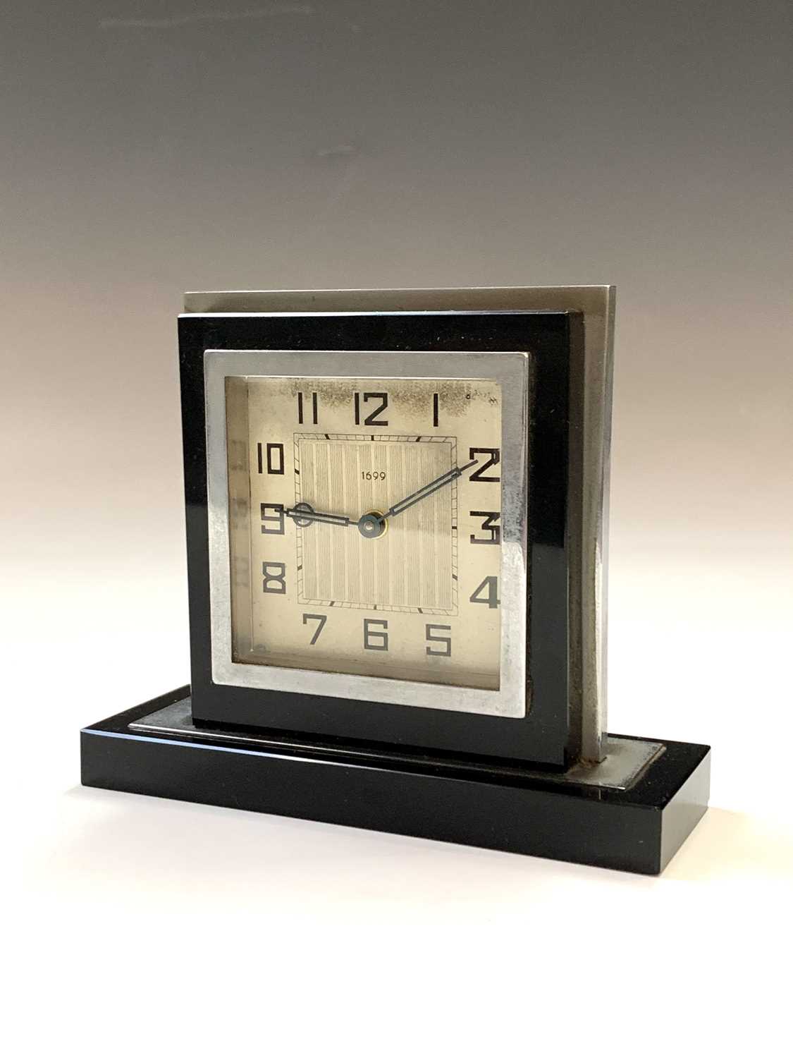 A black glass and nickel plated Art Deco clock. H: 12cm. - Image 4 of 5
