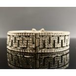 A silver Greek key hinged bangle 35gm