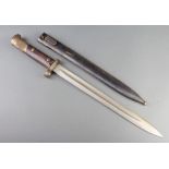 A Continental Mauser bayonet with 30cm blade complete with scabbard marked E3/48 TG Some rust to the