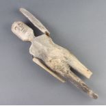A 19th Century carved wooden figure of a swimmer 32cmOne leg is F