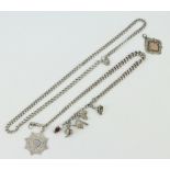 A silver Albert with fob and charms, a silver necklace and a loose fob, 130 grams