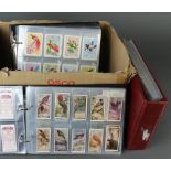 Three albums of various cigarette cards together with loose cigarette cards - Wills etc