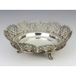 A Continental silver dish with circular pierced floral border 330 grams, 24cm