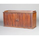 A 19th Century mahogany table top cabinet with three-quarter gallery, the interior fitted 18