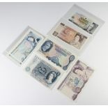 A twenty pound bank note and 12 others