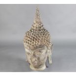 An Eastern cast bronze portrait bust of Buddha 95cm h x 42cm