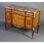 A 19th/20th Century French inlaid mahogany commode with shaped pink veined marble top and gilt metal