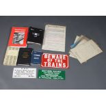 A grey plastic crate containing various British Railways staff notices and train driving manuals etc