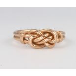 A 9ct rose gold knot ring, size P, 3.8 grams