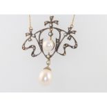 An Edwardian style silver gilt cultured pearl, diamond and seed pearl pendant