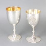 An Edwardian silver presentation cup Sheffield 1904, a large plain ditto with rubbed marks, 430
