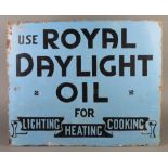 A blue enamelled double sided advertising sign - Use Royal Daylight Oil 46cm x 55cm Some pitting and