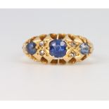 An 18ct yellow gold sapphire and diamond ring, size m 1/2, 3.8 grams
