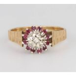 A 9ct ruby and diamond cluster ring size S, 3.5 grams