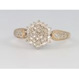 A 9ct yellow gold diamond cluster ring, size W, 3.6 grams