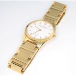 Alfred Dunhill, a gentleman's 18ct yellow gold wristwatch with calendar aperture on a gold