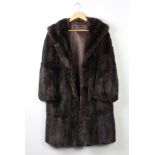 A full length beaver lamb coat, a lady's full length mink coat and 1 other (3)