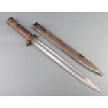 A Continental Mauser bayonet with 30cm blade marked Csze, complete with scabbard marked E25 with