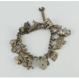 A silver charm bracelet 72 grams