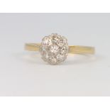 An 18ct yellow gold diamond cluster ring, size N 1.2, 2.7 grams