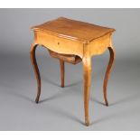 A 19th Century Continental mahogany work/dressing table of serpentine outline, the hinged lid fitted