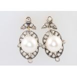 A pair of silver gilt cultured pearl and diamond earrings 0.8ct