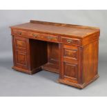 An Edwardian walnut dressing table/desk with raised back fitted 1 long and 2 short drawers above