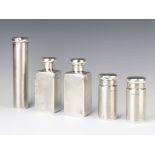 A set of 5 engine turned silver toilet jars with vacant cartouche London 1918, 549 gramsAll