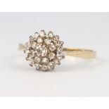 A 9ct yellow gold diamond cluster ring size O, 2.2 grams