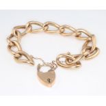 A 9ct yellow gold hollow link curb bracelet, 23.6 grams