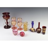 A Victorian red glass lustre with clear glass drops 24cm and minor coloured glassware