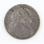 A William and Mary half crown (1688-1694) dated 1689, their conjoined busts facing right, the