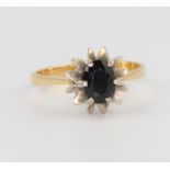 An 18ct yellow gold sapphire dress ring, size Q 1/2, 4.1 grams