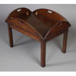 A 19th Century style mahogany drop flap butler's coffee table, raised on square tapered supports
