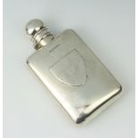 A Victorian silver hip flask with shield shaped vacant cartouche Birmingham 1887, 126 grams