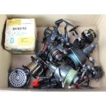 An Intrepid Elite fishing reel boxed, a Diwa no.770 fishing reel, a Compac Continental fishing reel,