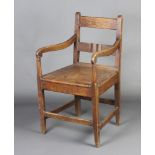 An 18th/19th Century elm bar back carver chair with solid seat raised on square supports with box