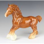 A Beswick figure of a cantering shire no.975, chestnut gloss, 22cm, modelled by Arthur Greddington